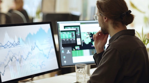 Man analyzing air quality data on a dashboard.